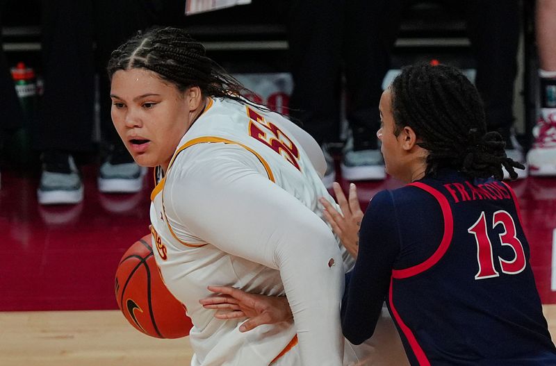Iowa State Cyclones' center Audi Crooks (55) looks for drive to the basket as Arizona Wildcats forward Nora Francois (13) defends during the third quarter in the Big-12 women’s basketball on Jan. 24, 2026, at Hilton Coliseum in Ames, Iowa.