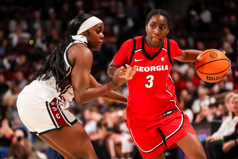 Georgia Bulldogs guard Dani Carnegie (3) drives around South Carolina Gamecocks guard Raven Johnson