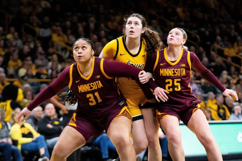 Players look to the basket after a pair of Hawkeye free throws on Feb. 5, 2026, at Carver-Hawkeye Arena.