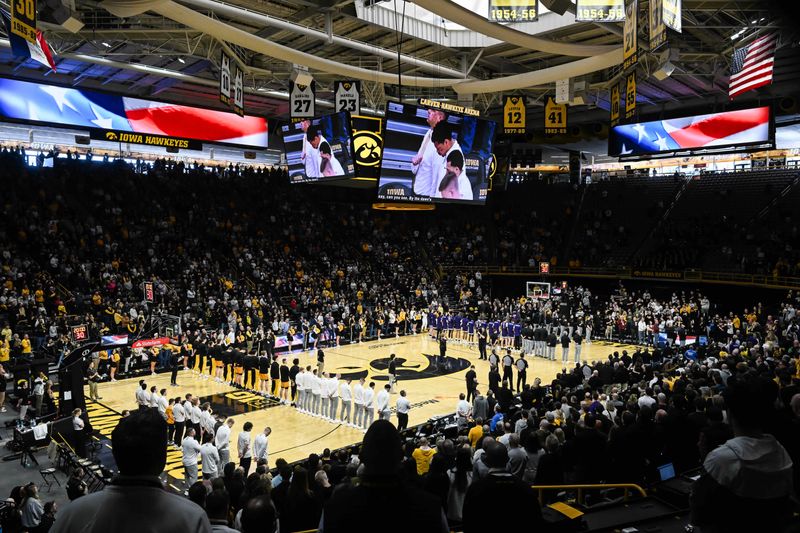 Feb 8, 2026; Iowa City, Iowa, USA; A general view of Carver-Hawkeye Arena during the national anthem before the game between the Iowa Hawkeyes and the Northwestern Wildcats. Mandatory Credit: Jeffrey Becker-Imagn Images