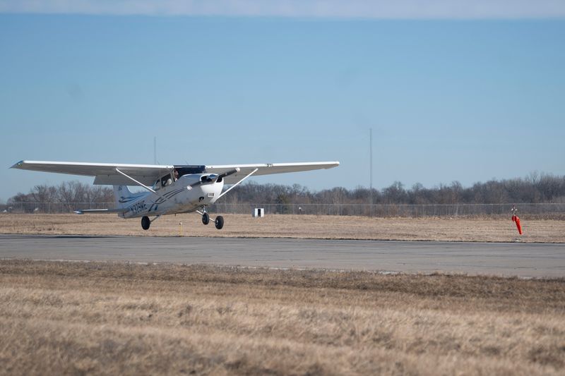 An airplane lands on the main runway at Ankeny Regional Airport on Wednesday, Feb. 11, 2026 in Ankeny.