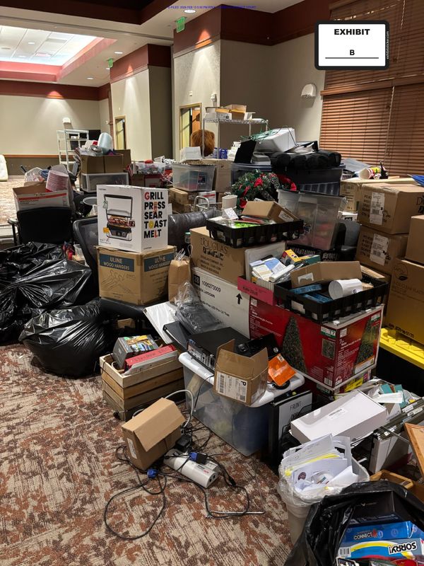 Achieva's personal property tossed into pile in the Honey Creek Resort ballroom.