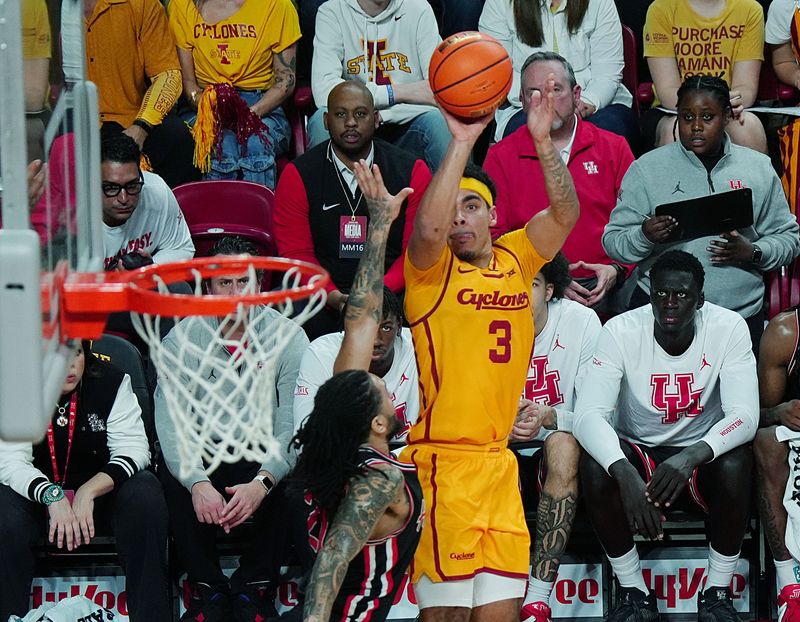 Iowa State Cyclones guard Tamin Lipsey (3) tales a shot over Houston Cougars forward/center Chris Cenac Jr.(5) during the first half in the Big-12 men’s basketball at Hilton Coliseum on Feb. 16, 2026, in Ames, Iowa