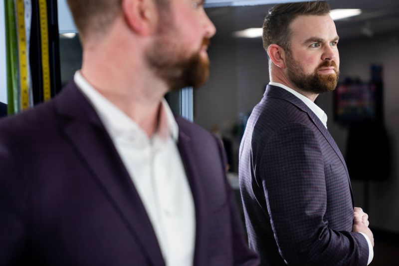 Langel & Woods owner Colby Elmitt stands for a portrait on Feb. 13, 2026, in West Des Moines.