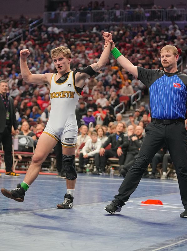 Landen Davis of Eddyville-Blakesburg-Fremont wrestles Owen Henriksen of Alburnett in the 144-pound championship match during the Class 2A finals of the Iowa high school state wrestling tournament at the Casey's Center in Des Moines, Feb. 21, 2026.