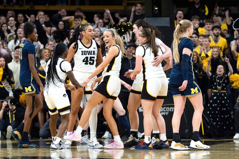 The Iowa Hawkeyes react during a basketball game against the Michigan Wolverines Feb. 22, 2026 at Carver-Hawkeye Arena in Iowa City, Iowa.