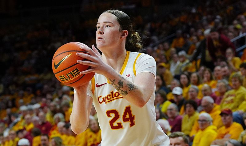 Iowa State Cyclones' forward Addy Brown (24) takes a three-point shot against Oklahoma State Cowgirls during the first quarter in the senior day women basketball at Hilton Coliseum on February. 25, 2026, in Ames, Iowa.