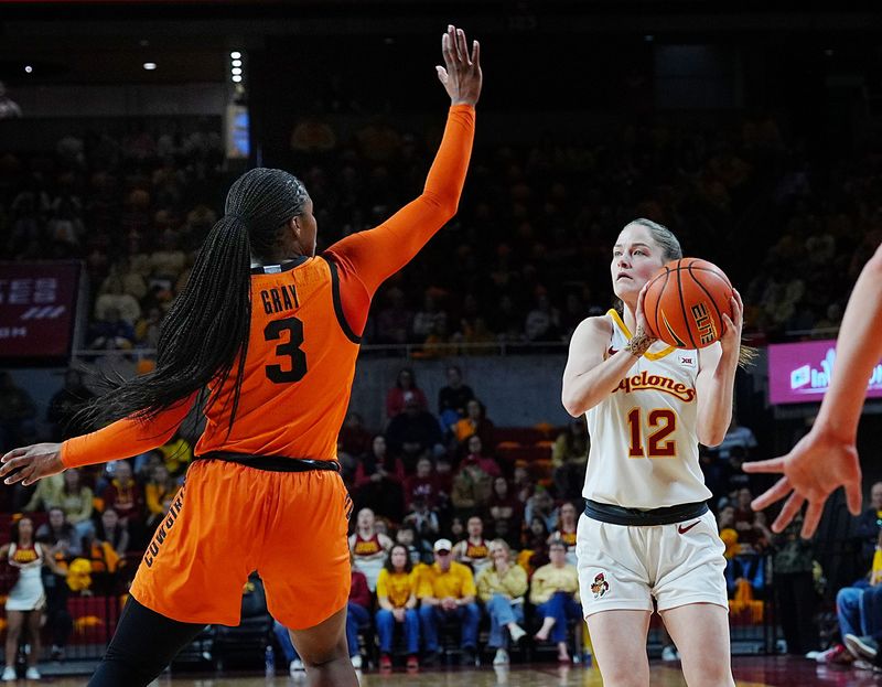 Iowa State Cyclones' guard Kenzie Hare (12) takes a three-point shot over Oklahoma State Cowgirls guard Micah Gray (3) during the first quarter in the senior day women basketball at Hilton Coliseum on February. 25, 2026, in Ames, Iowa.