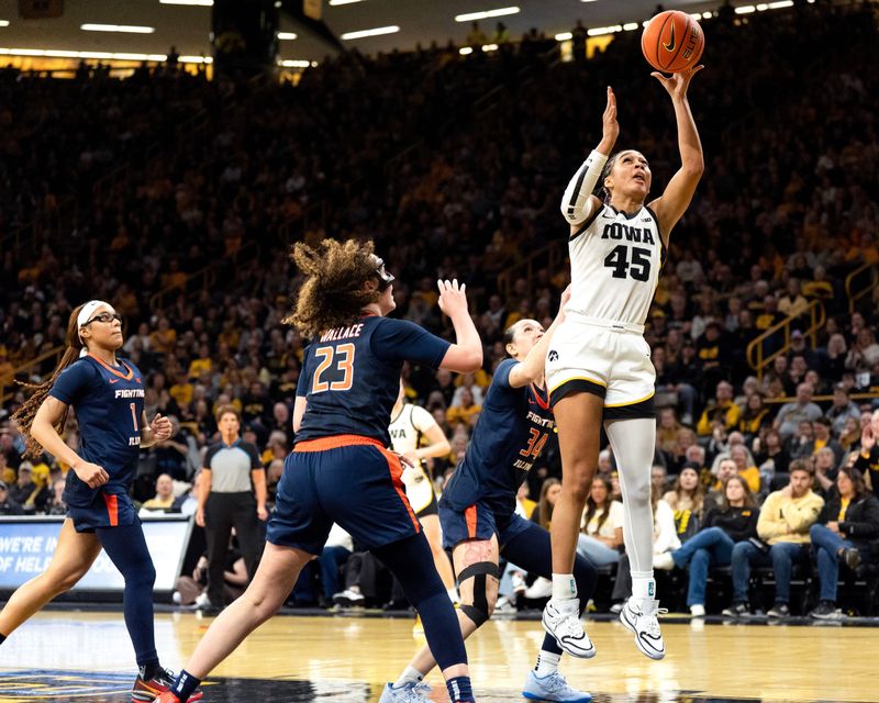 Iowa forward Hannah Stuelke (45) shoots the basketball against the Illinois Fighting Illini Feb. 26, 2026 at Carver-Hawkeye Arena in Iowa City, Iowa.