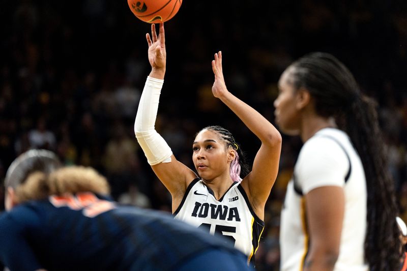 Iowa forward Hannah Stuelke (45) shoots a free throw late in the fourth quarter against the Illinois Fighting Illini on Feb. 26, 2026, at Carver-Hawkeye Arena in Iowa City, Iowa.
