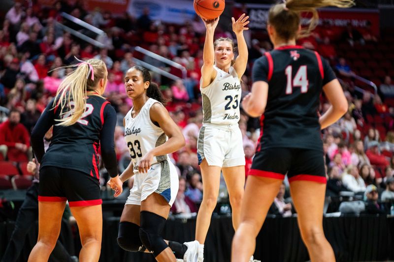 Bishop Heelan's Melina Snoozy (23) scored a Class 4A single-game state tournament record 39 points in Tuesday's quarterfinal win over North Polk.