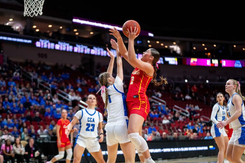 Carlisle's Mallie Stoner (2) shoots the ball over Clear Creek Amana's Alex Schrage (1) on March 3, 2026, at Casey’s Center in Des Moines.