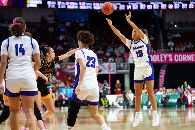 Johnston's Jenica Lewis (10) shoots a three-pointer against Ankeny in the girls state semi-final against Ankeny on March 5, 2026, at Casey’s Center in Des Moines.