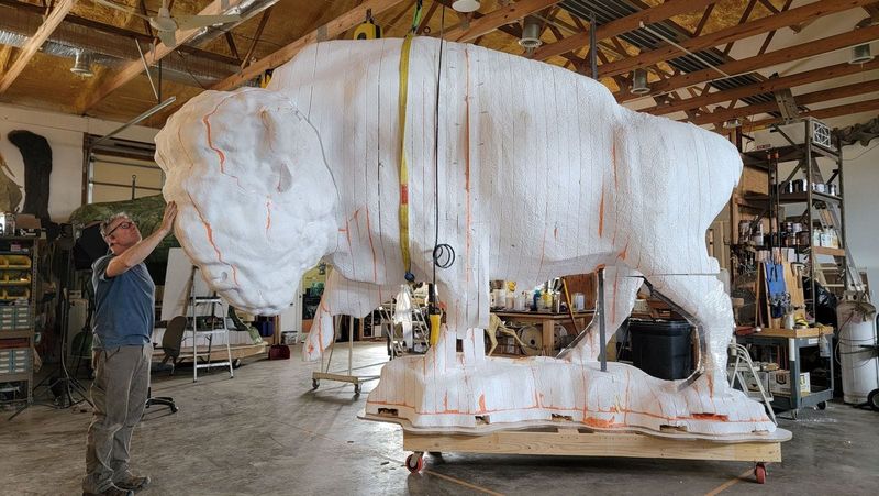 Gary Staab preparing the bull bison sculpture. Each of the three statues are around 1.25 times the size of an actual bison.