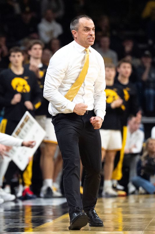 Iowa head coach Ben McCollum reacts during a Big Ten basketball game against the Michigan Wolverines March 5, 2026 at Carver-Hawkeye Arena in Iowa City, Iowa.