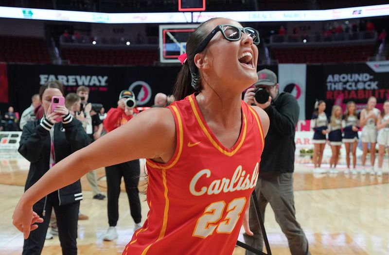 Carlisle senior and Iowa State signee Macy Comito (23) celebrates after defeating Bishop Heelan in the Class 4A high school state semifinal on March 5, 2026, at Casey’s Center in Des Moines.