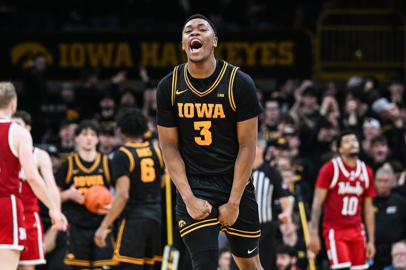 Feb 17, 2026; Iowa City, Iowa, USA; Iowa Hawkeyes forward Cam Manyawu (3) reacts during the second half against the Nebraska Cornhuskers at Carver-Hawkeye Arena. Mandatory Credit: Jeffrey Becker-Imagn Images