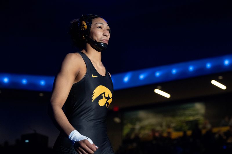 Iowa’s Kennedy Blades walks out to the mat March 7, 2026 for her 160-pound NCAA Women’s Wrestling Championship match at Xtream Arena in Coralville, Iowa.