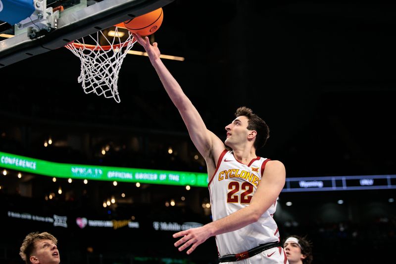 Mar 11, 2026; Kansas City, MO, USA; Iowa State Cyclones forward Milan Momcilovic (22) shoots the ball during the first half against the Arizona State Sun Devils at T-Mobile Center. Mandatory Credit: William Purnell-Imagn Images