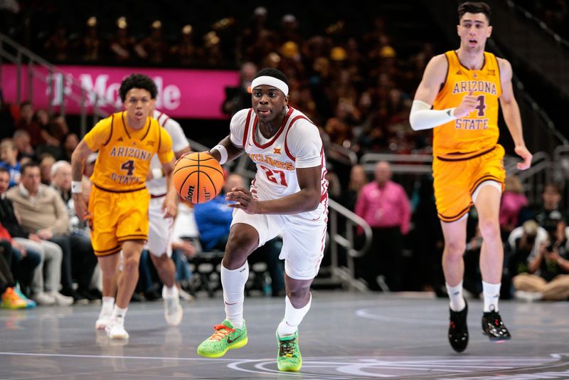 Mar 11, 2026; Kansas City, MO, USA; Iowa State Cyclones guard Killyan Toure (27) brings the ball up court during the first half against the Arizona State Sun Devils at T-Mobile Center. Mandatory Credit: William Purnell-Imagn Images