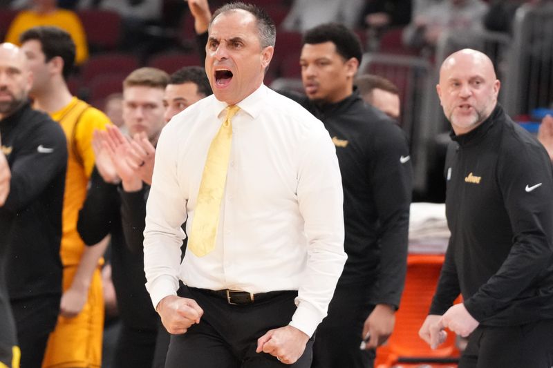 Mar 11, 2026; Chicago, IL, USA; Iowa Hawkeyes head coach Ben McCollum on the bench against the Maryland Terrapins during the second half at United Center. Mandatory Credit: David Banks-Imagn Images