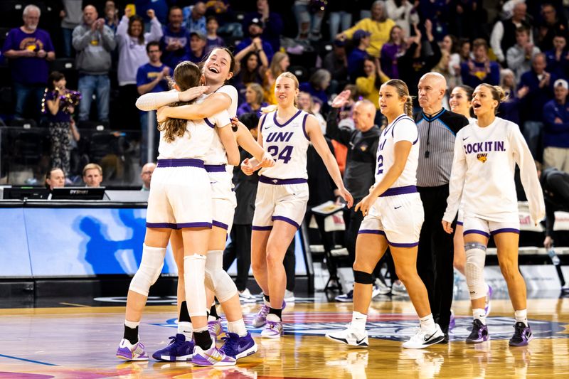 Northern Iowa Panthers players celebrate their win over Bradley during the Missouri Valley Conference Women's Basketball Tournament, Friday, March 13, 2026, at Xtream Arena in Coralville, Iowa.