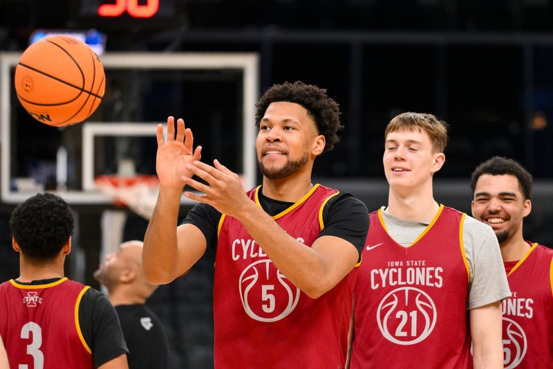Mar 19, 2026; St. Louis, MO, USA; Iowa State Cyclones forward Joshua Jefferson (5) receives a pass during a practice session ahead of the first round of the men's 2026 NCAA Tournament at Enterprise Center. Mandatory Credit: Jeff Curry-Imagn Images