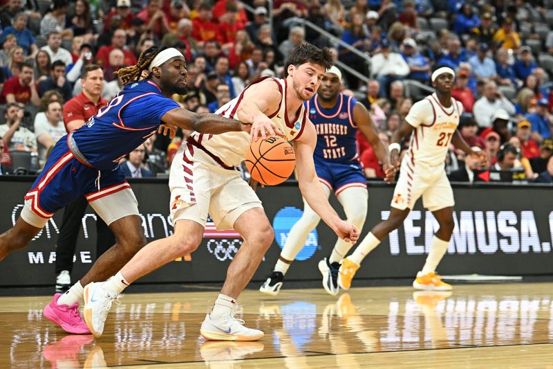 Mar 20, 2026; St. Louis, MO, USA; Tennessee State Tigers guard Aaron Nkrumah (30) vies for the ball against Iowa State Cyclones guard Nate Heise (0) during the first half of a first round game of the men's 2026 NCAA Tournament at Enterprise Center. Mandatory Credit: Jeff Le-Imagn Images