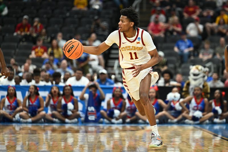 Mar 20, 2026; St. Louis, MO, USA; Iowa State Cyclones guard Dominick Nelson (11) brings the ball upcourt against the Tennessee State Tigers during the second half of a first round game of the men's 2026 NCAA Tournament at Enterprise Center. Mandatory Credit: Jeff Le-Imagn Images