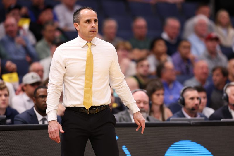 Mar 20, 2026; Tampa, FL, USA; Iowa Hawkeyes head coach Ben McCollum looks on during the first half against the Clemson Tigers during a first round game of the men's 2026 NCAA Tournament at Benchmark International Arena. Mandatory Credit: Matt Pendleton-Imagn Images