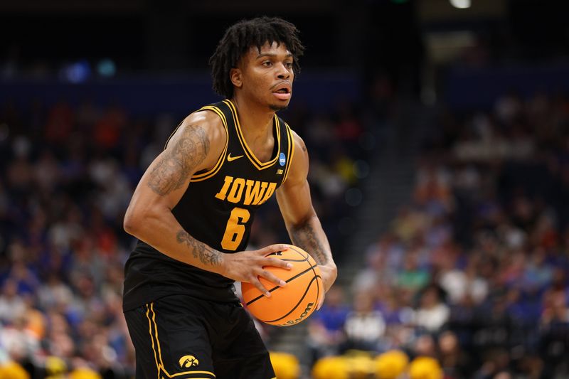 Mar 20, 2026; Tampa, FL, USA; Iowa Hawkeyes forward Tavion Banks (6) passes the ball in the first half against the Clemson Tigers during a first round game of the men's 2026 NCAA Tournament at Benchmark International Arena. Mandatory Credit: Nathan Ray Seebeck-Imagn Images