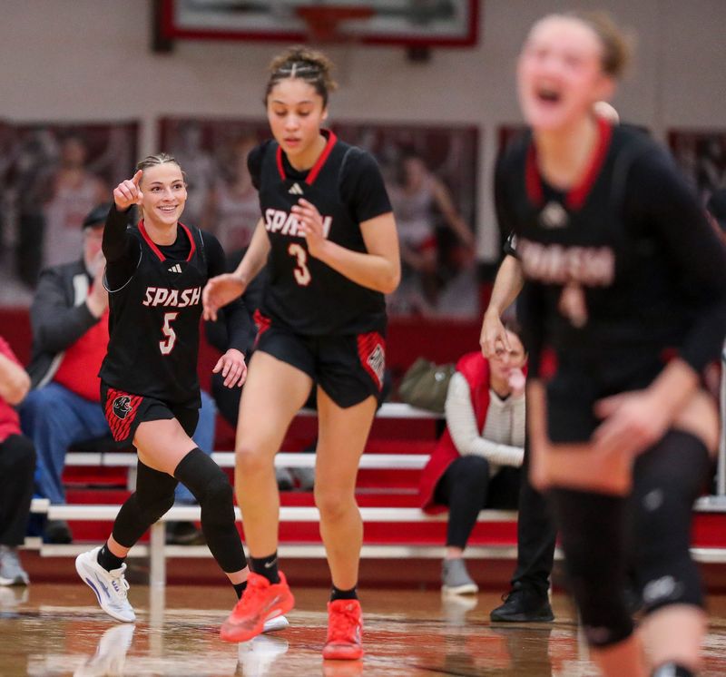 SPASH's Jada Seubert (5) reacts after scoring a basket against De Pere High School during a WIAA Division 1 sectional semifinal on Thursday, March 5, 2026, at Pulaski High School in Pulaski, Wis. SPASH won the game, 67-49.
Tork Mason/USA TODAY NETWORK-Wisconsin