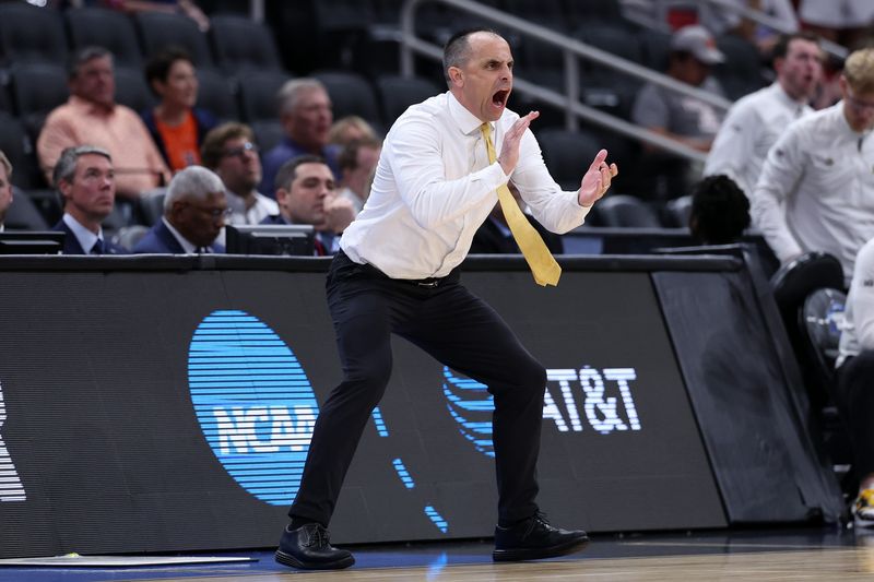 Mar 26, 2026; Houston, TX, USA; Iowa Hawkeyes head coach Ben McCollum reacts in the first half during a Sweet Sixteen game of the South Regional of the men's 2026 NCAA Tournament at Toyota Center. Mandatory Credit: Troy Taormina-Imagn Images