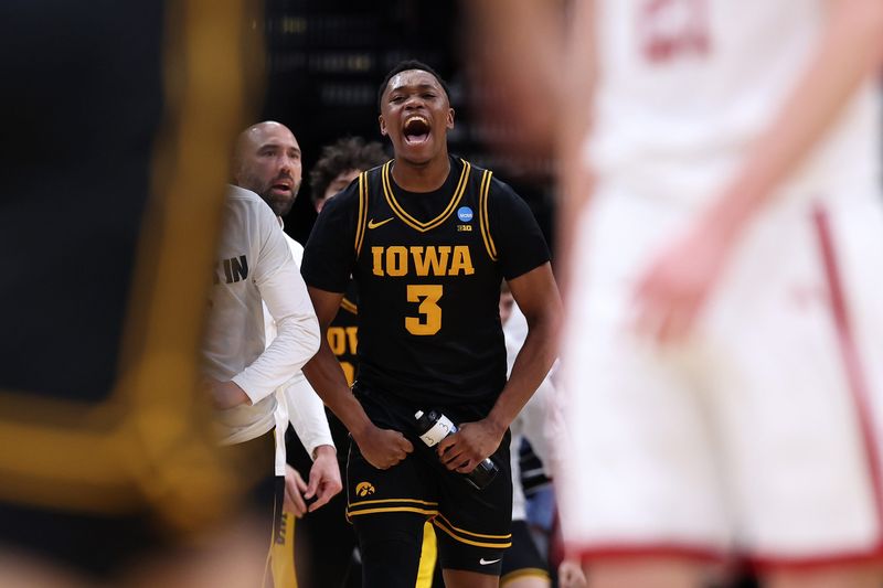 Mar 26, 2026; Houston, TX, USA; Iowa Hawkeyes forward Cam Manyawu (3) reacts against the Nebraska Cornhuskers in the second half during a Sweet Sixteen game of the South Regional of the men's 2026 NCAA Tournament at Toyota Center. Mandatory Credit: Troy Taormina-Imagn Images