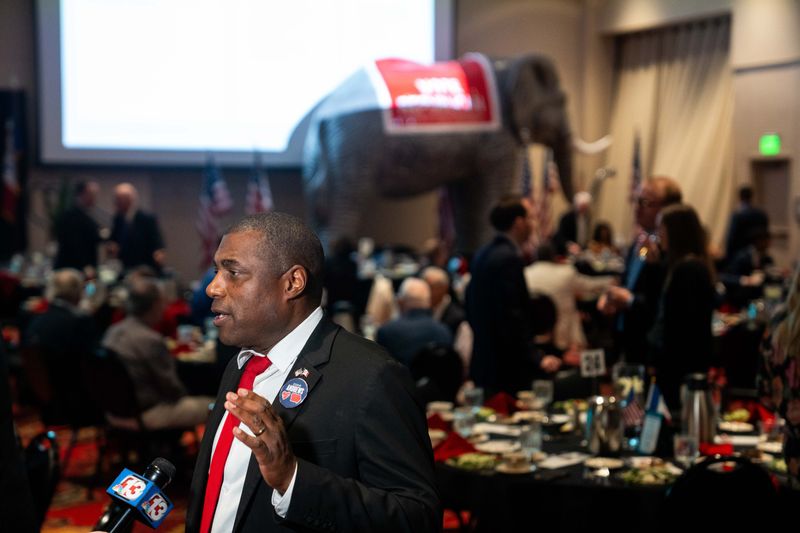 Iowa Republican candidate for governor Eddie Andrews talks with local media during the Republican Party of Polk County’s Lincoln Dinner on March 26, 2026, in Des Moines.
