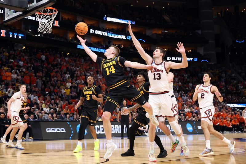 Mar 28, 2026; Houston, TX, USA; Iowa Hawkeyes guard Bennett Stirtz (14) shoots against Illinois Fighting Illini center Tomislav Ivisic (13) in the second half during an Elite Eight game of the South Regional of the men's 2026 NCAA Tournament at Toyota Center. Mandatory Credit: Troy Taormina-Imagn Images