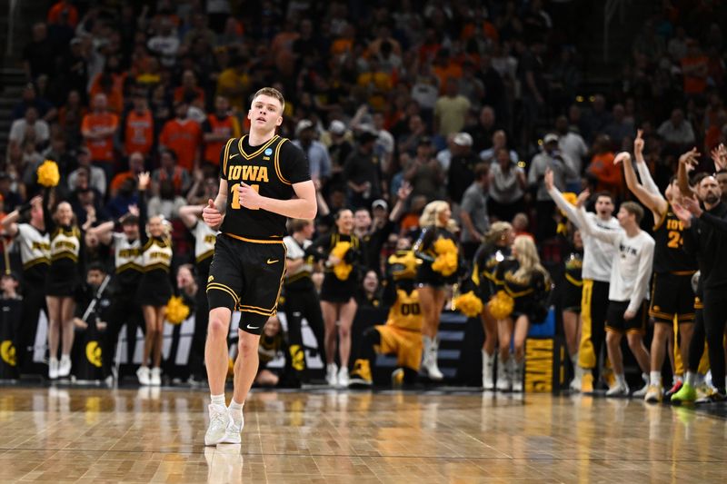 Mar 28, 2026; Houston, TX, USA; Iowa Hawkeyes guard Bennett Stirtz (14) reacts in the first half against the Illinois Fighting Illini during an Elite Eight game of the South Regional of the men's 2026 NCAA Tournament at Toyota Center. Mandatory Credit: Maria Lysaker-Imagn Images