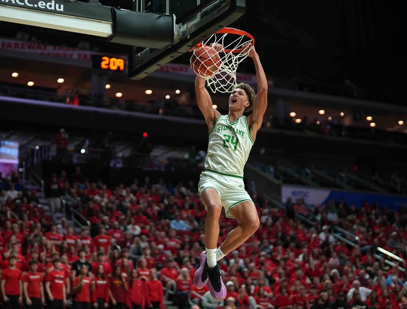 Storm Lake junior Jaidyn Coon dunks the basketball against ADM during the Iowa high school boys state basketball tournament on Monday, March 10, 2025, at Wells Fargo Arena in Des Moines. Mandatory Credit: Bryon Houlgrave-The Des Moines Register