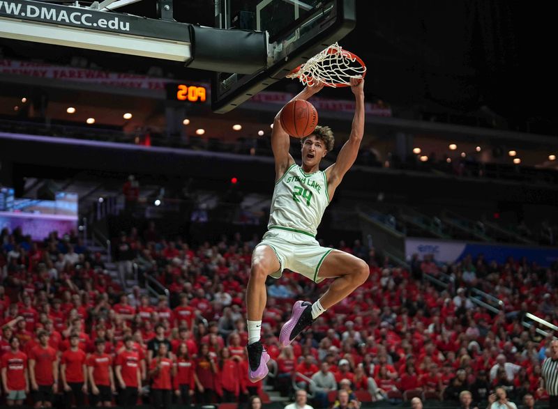 Storm Lake junior Jaidyn Coon dunks the basketball against ADM during the Iowa high school boys state basketball tournament on Monday, March 10, 2025, at Wells Fargo Arena in Des Moines. Mandatory Credit: Bryon Houlgrave-The Des Moines Register