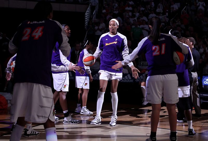 PHOENIX - AUGUST 26: Tangela Smith #50 of the Phoenix Mercury is introduced before Game One of the Western Conference Semifinals against the San Antonio Silver Stars during the 2010 WNBA Playoffs at US Airways Center on August 26, 2010 in Phoenix, Arizona. The Mercury defeated the Silver Stars 106-93. NOTE TO USER: User expressly acknowledges and agrees that, by downloading and or using this photograph, User is consenting to the terms and conditions of the Getty Images License Agreement. (Photo by Christian Petersen/Getty Images)