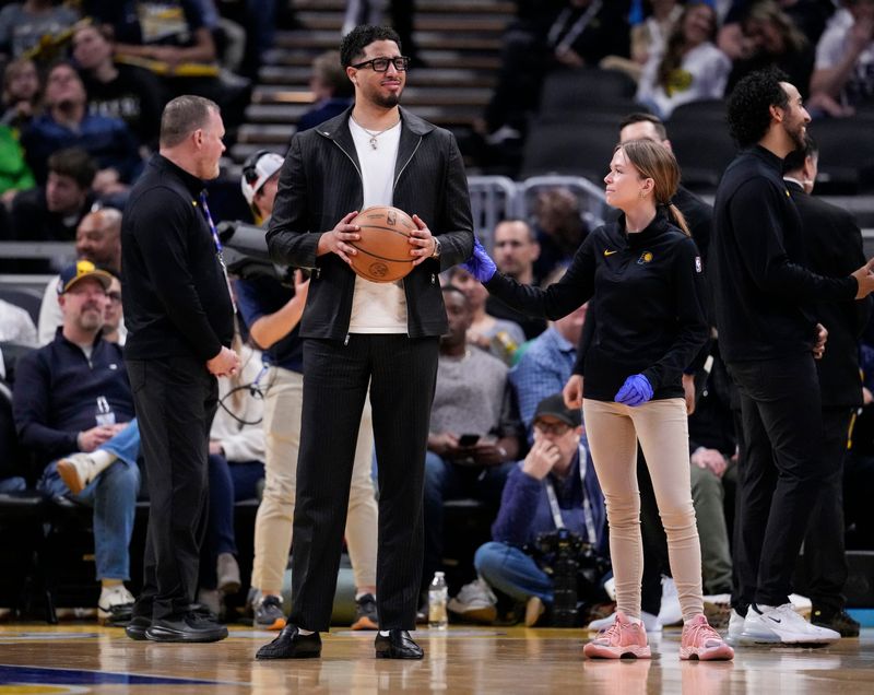 Indiana Pacers guard Tyrese Haliburton (0) stands on the court during a time-out Tuesday, April 7, 2026, during the game at Gainbridge Fieldhouse in Indianapolis.