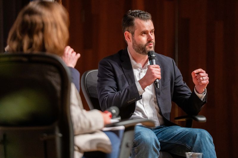Democratic U.S. Senate candidate and State Sen. Zach Wahls speaks to the crowd during a candidate forum hosted by End Citizens United and Progress Iowa on April 8, 2026, at the State Historical Society of Iowa.