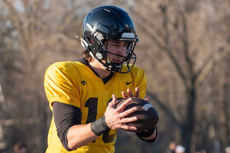 Iowa quarterback Jeremy Hecklinski (10) receives a snap during practice April 9, 2026 in Iowa City, Iowa.