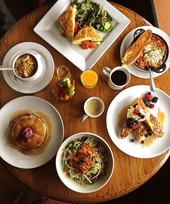 Brunch at The Café in Ames blends global flavors with Midwest comfort, from scallion‑pancake‑topped plates to French toast classics.