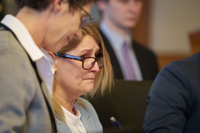 Kristin Ramsey sits in a hearing at the Dallas County Courthouse, April 10, 2026. Ramsey, 53, was charged in March with first-degree murder for the 2011 shooting of Ashley Okland.
