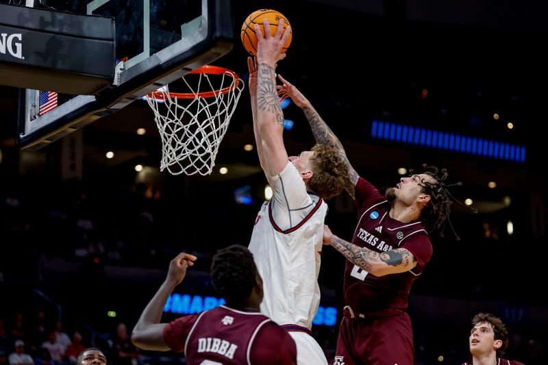 Mar 19, 2026; Oklahoma City, OK, USA; Saint Mary's (CA) Gaels center Andrew McKeever (45) takes a shot during a first round game of the men's 2026 NCAA Tournament at Paycom Center. Mandatory Credit: Alonzo Adams-Imagn Images