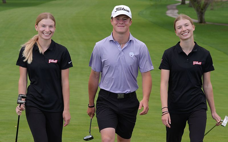 Gilbert girls golfers Ella Lohrbach (left) and Ava Lohrbach, and Nevada boys golfer Parker Rodgers, were the best golfers in Class 3A during the 2025 season. They have learned a lot from each other and built close friendships golfing together during the offseason as the Lohrbachs look to go 1-2 individually and lead Gilbert to another team title, while Rodgers goes for a repeat individual title at state in 2026.