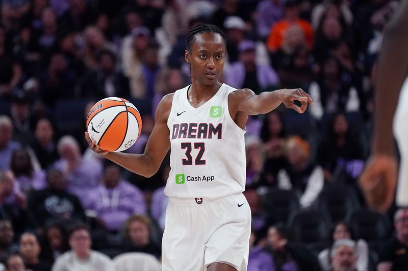 Aug 17, 2025; San Francisco, California, USA; Atlanta Dream guard Shatori Walker-Kimbrough (32) dribbles upcourt against the Golden State Valkyries in the fourth quarter at Chase Center. Mandatory Credit: David Gonzales-Imagn Images