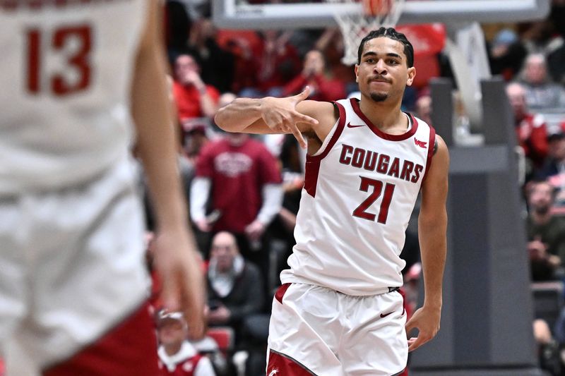 Jan 15, 2026; Pullman, Washington, USA; Washington State Cougars guard Ace Glass Lll (21) celebrates after making a three-point basket against the Gonzaga Bulldogs in the first half at Friel Court at Beasley Coliseum. Mandatory Credit: James Snook-Imagn Images