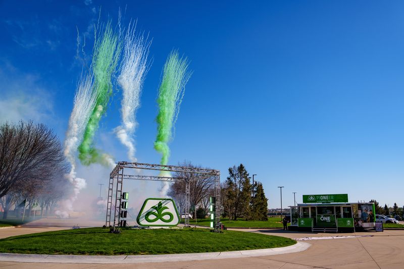 Pyrotechnics mark the reveal of a new sculpture of the Pioneer logo during Pioneer's 100th anniversary, Monday, April 20, 2026, in Johnston.